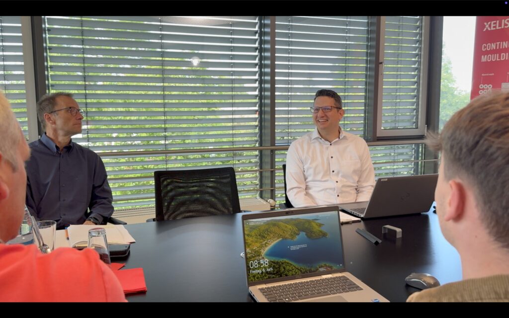 a group of people discussing about internal Audit and ISO 19011.